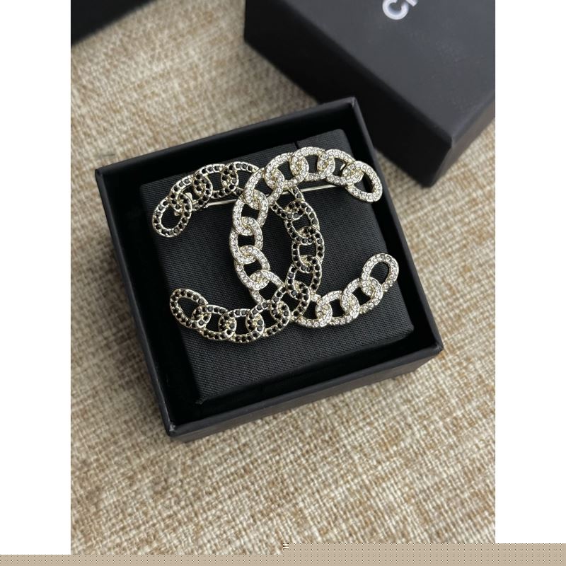 Ch*el brooches